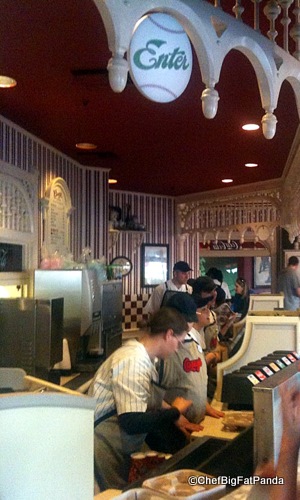 Cast Members Hustle Behind the Counter
