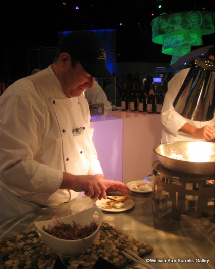 Chef-from-Magic-Kingdom-Theme-Park-preparing-Lamb-and-Spinach-Cigars-with-Blood-Orange-Tzatziki.-422x525.jpg