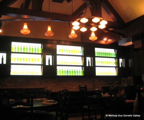 From-my-side-of-the-table-I-had-a-view-of-a-wall-of-back-lit-wine-bottles-and-olive-oil-containers.-500x419.jpg