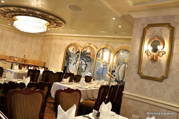 The dining room space near the Cinderella mosaic—gorgeous lighting too!