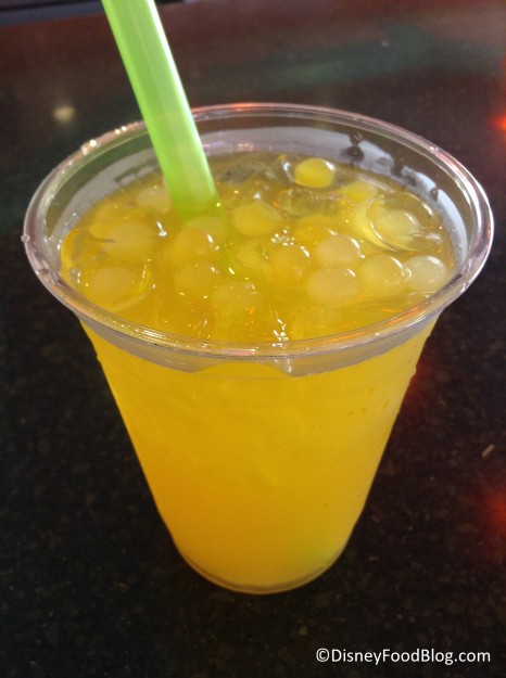 Mango green tea with popping bubbles
