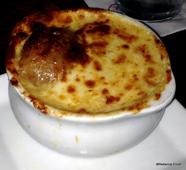 French Onion Soup Topped with a Crouton and Gruyere Cheese
