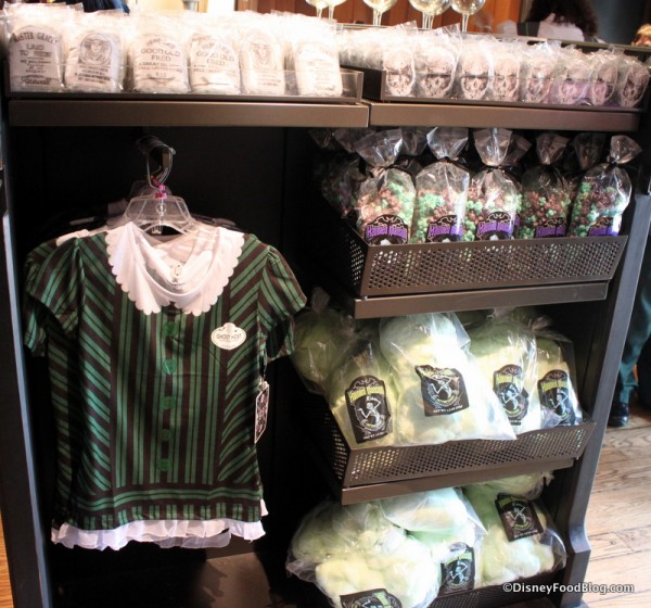 Women's Haunted Mansion Cast Member shirt in display
