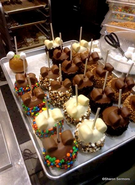 Watch Mickey candy apples being made