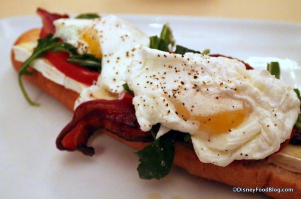 Closeup on Open-Face Bacon and Egg Sandwich
