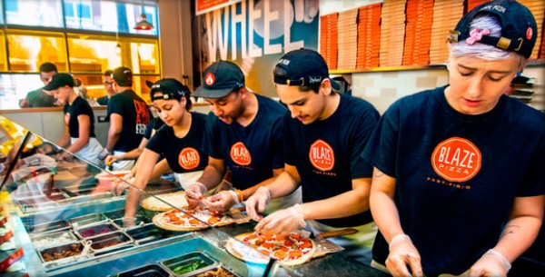 Blaze pizza's assembly line -- photo copyright Blaze pizza