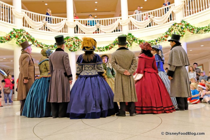 Dickens Carolers Sing for Guests