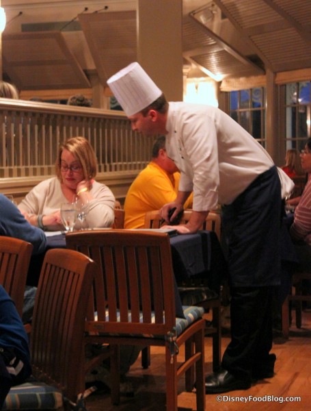 Chef Discussing Menu with Guests