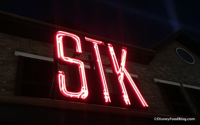 STK Orlando sign at night