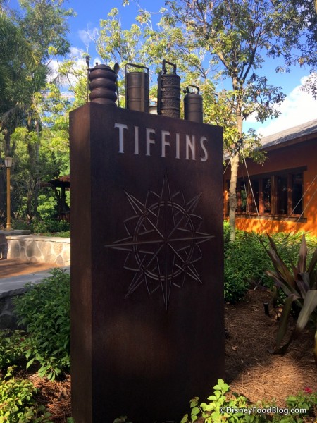 Tiffins Sign, with tiffins on top