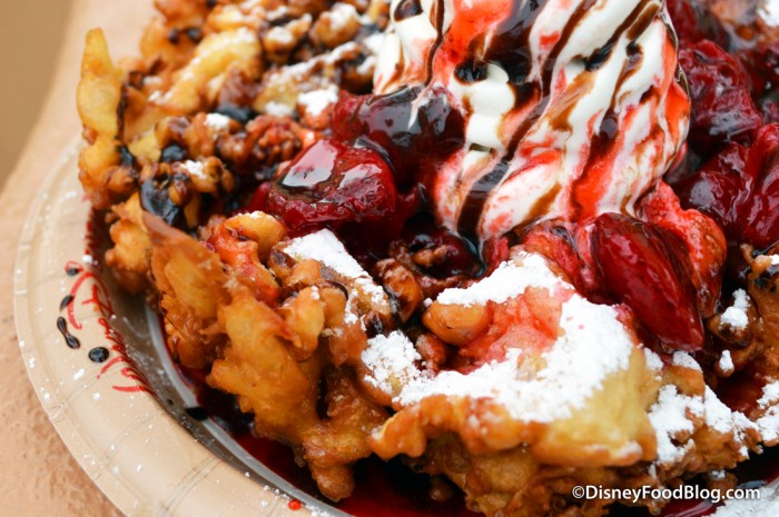 Funnel Cake with Vanilla Soft Serve, Strawberry Sauce, and Chocolate Drizzle -- Up Close