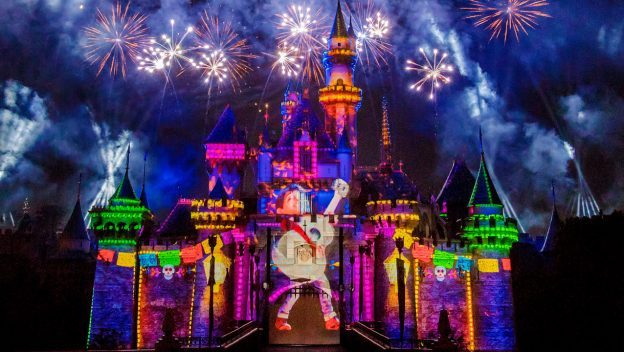 DISNEYLAND PIXAR FEST Miguel-from-Coco-projected-on-the-Sleeping-Beauty-Castle-Together-Forever-pixar-fest-nighttime-spectacular