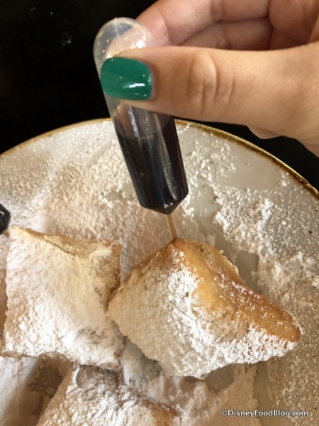 Inserting the Kahlua into the Beignet