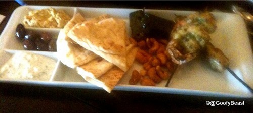 Kouzzina Sampler: Prawns and Chicken on Skewers, Olives, Spiced Cashews, Dolmades, Tzatziki, Hummus and Pita