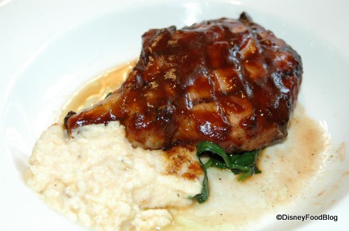 Grilled Pork Chop with Chipotle Barbecue Sauce and Smoked Cheddar Grits