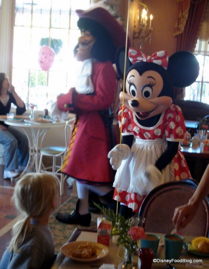 Minnie greets her guests