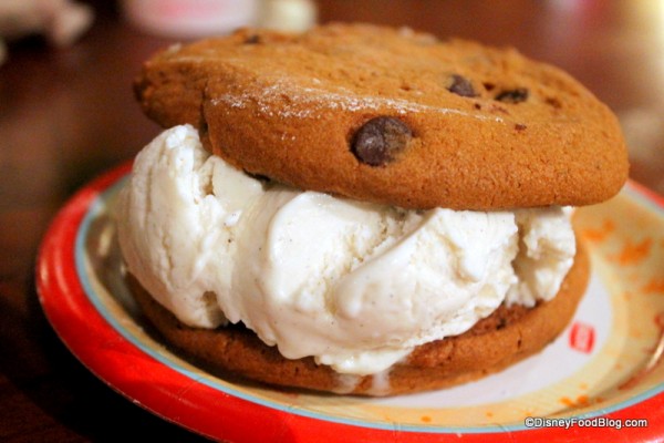 Ice cream nestled between two homemade cookies