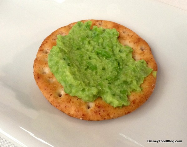 Pea and Garlic Dip on a cracker