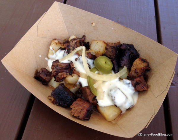 Beef Brisket Burnt Ends Hash with White Cheddar Fondue and Pickled Jalapeños from the Smokehouse Outdoor Kitchen