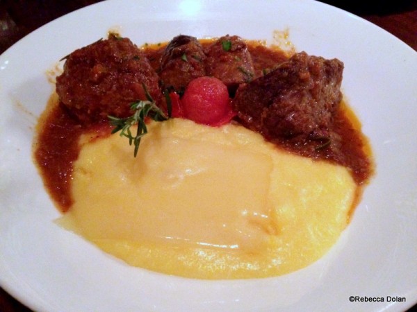 Polenta with sausage, meatballs, and short ribs
