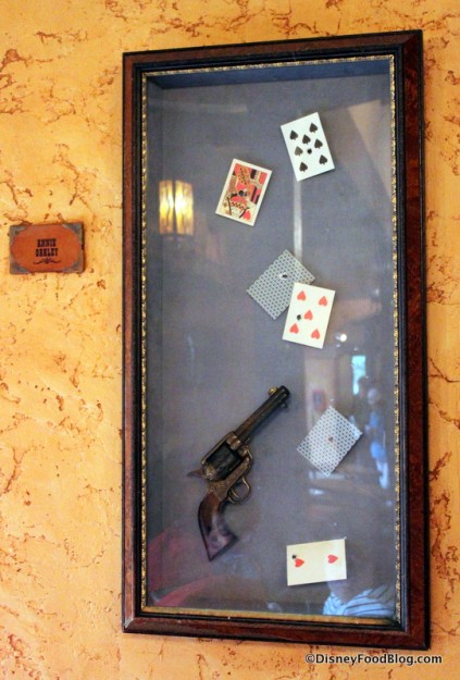 Revolver and Bullet-Riddled Playing Cards
