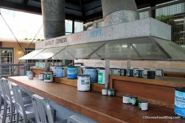 Paint cans in outdoor seating
