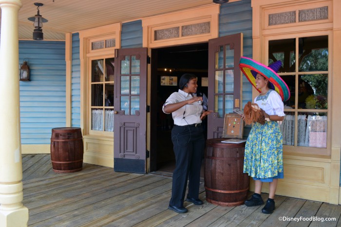 Cast Members Welcoming Guest at Pecos Bill Tall Tale Inn and Cafe