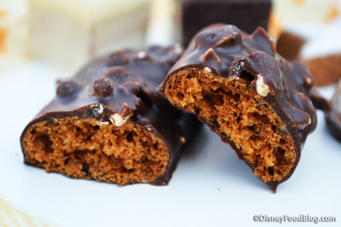 Gingerbread bars covered with dark chocolate and nuts