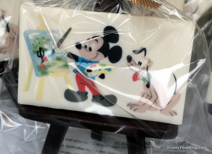 2017 Epcot International Festival of the Arts The Masterpiece Kitchen Food Studio Mickey and Pluto White Chocolate Painting featured 1