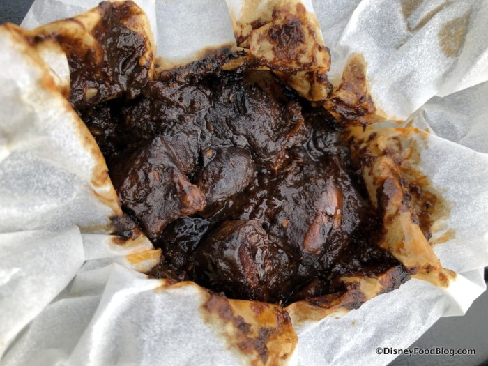 Mixiote de Cordero: Wrapped Slow Braised Lamb marinated in Tres Chiles Paste and Spices