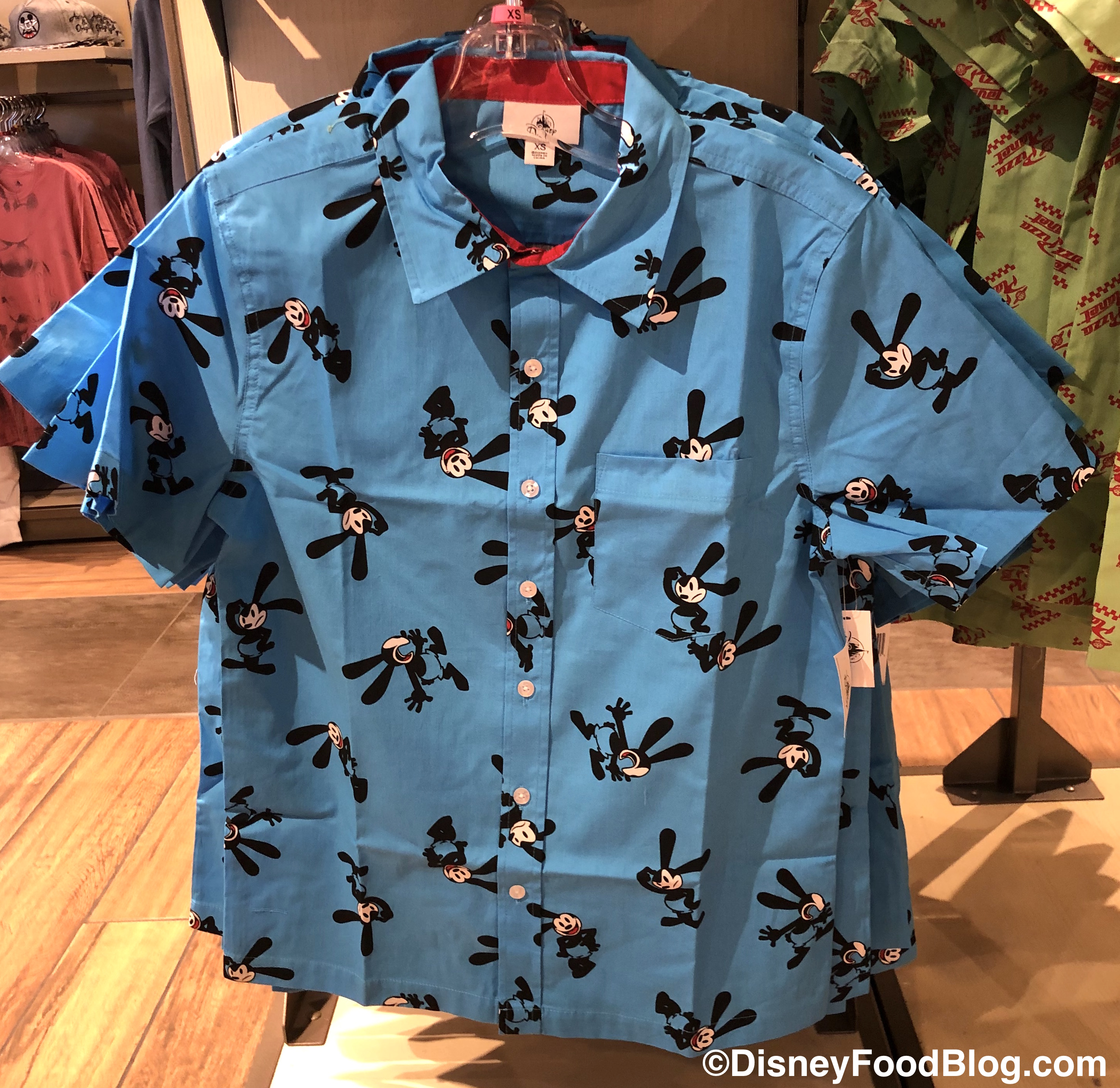 We Spotted New Button-Up Shirts in Disney World Featuring Oswald the ...