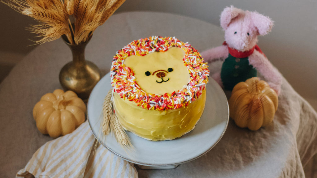 https://www.disneyfoodblog.com/wp-content/uploads/2020/11/Winnie-the-Pooh-Cake-AE.jpg