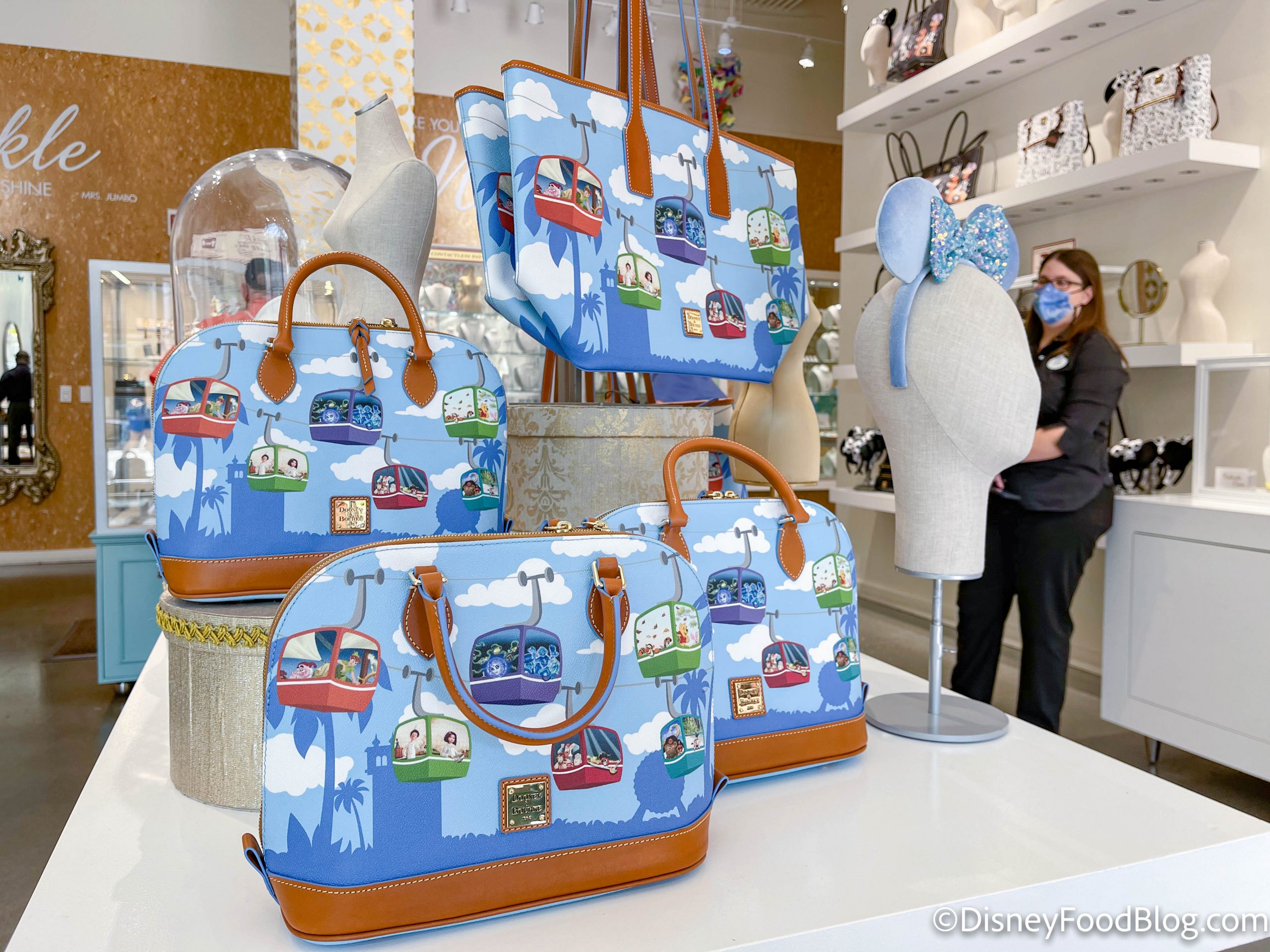 https://www.disneyfoodblog.com/wp-content/uploads/2021/02/wdw-2021-disney-springs-ever-after-jewelry-co-skyliner-dooney-and-bourke-bags-purses-scaled.jpg