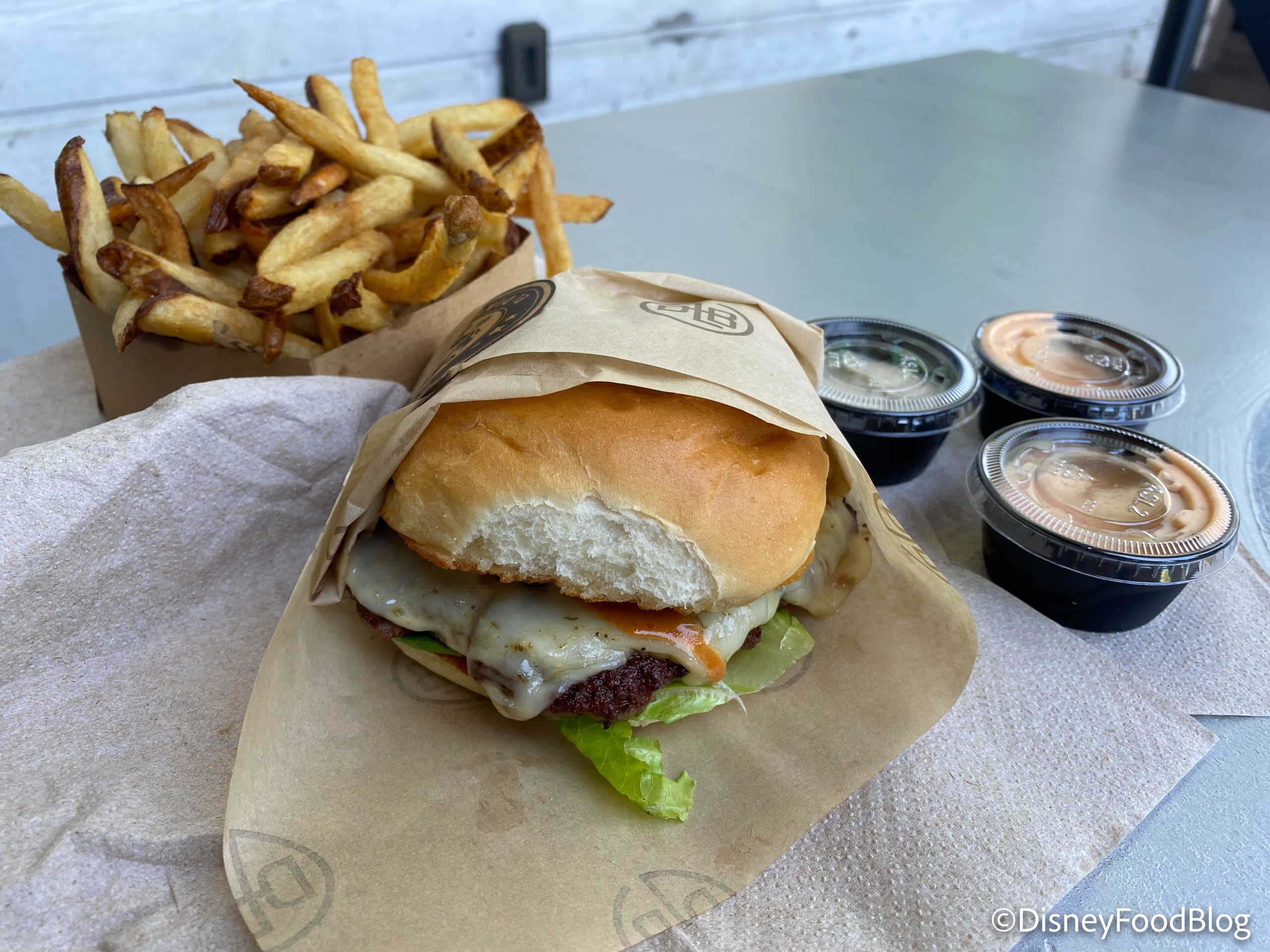 Review Beware This Burger In Disney Springs Has Got A Kick The Disney Food Blog