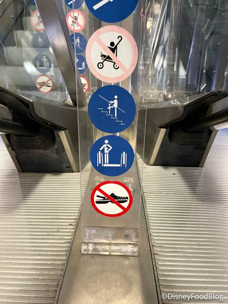 2021-wdw-disney-springs-escalator-sign-n