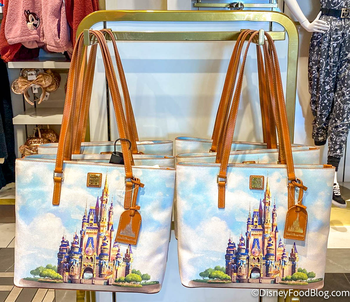 PHOTOS: Disney World Just Dropped A New 50th Anniversary Dooney & Bourke  Bag — And it's EPIC
