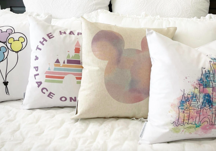https://www.disneyfoodblog.com/wp-content/uploads/2022/07/jane.com-happiest-place-on-earth-pillow-covers-disney-pillows-affiliate-2-700x491.png