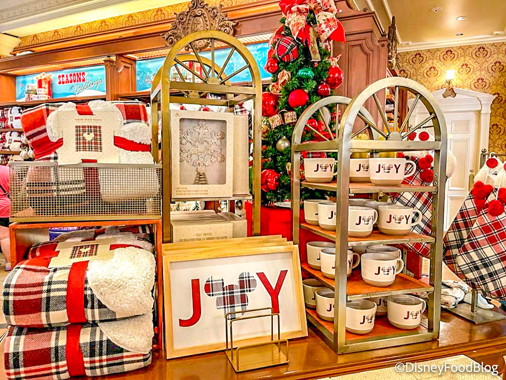 https://www.disneyfoodblog.com/wp-content/uploads/2022/11/2022-wdw-mk-emporium-holiday-christmas-merchandise-joy-collection-display.jpg
