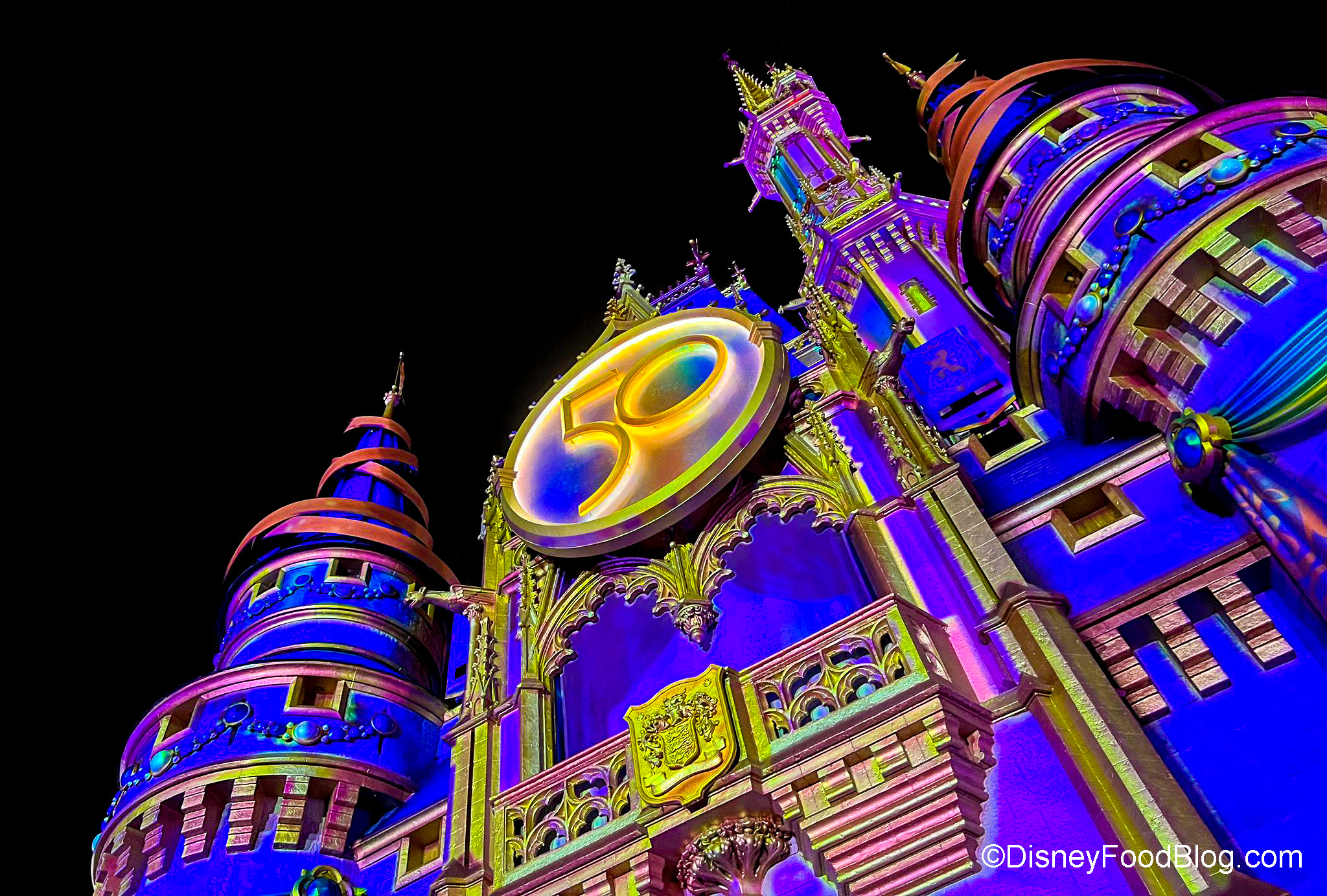 https://www.disneyfoodblog.com/wp-content/uploads/2022/11/2022-wdw-mk-holidays-night-cinderella-castle-stock.jpg