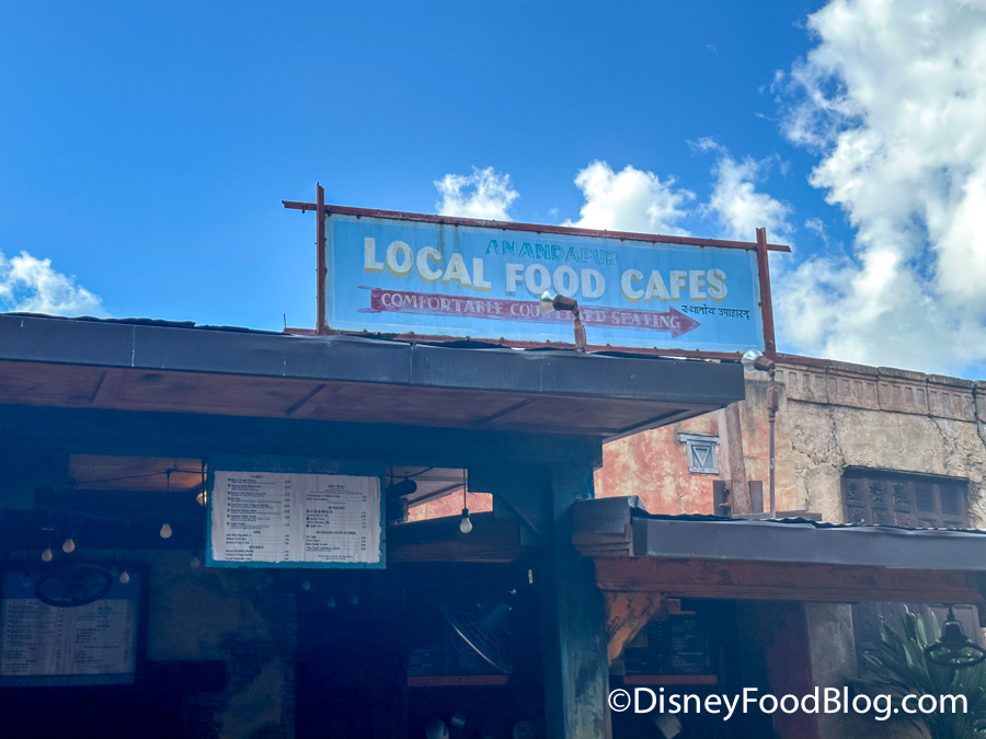 https://www.disneyfoodblog.com/wp-content/uploads/2023/08/2023-dak-yak-and-yeti-local-foods-cafe-entrance-atmos-sign-1.jpg